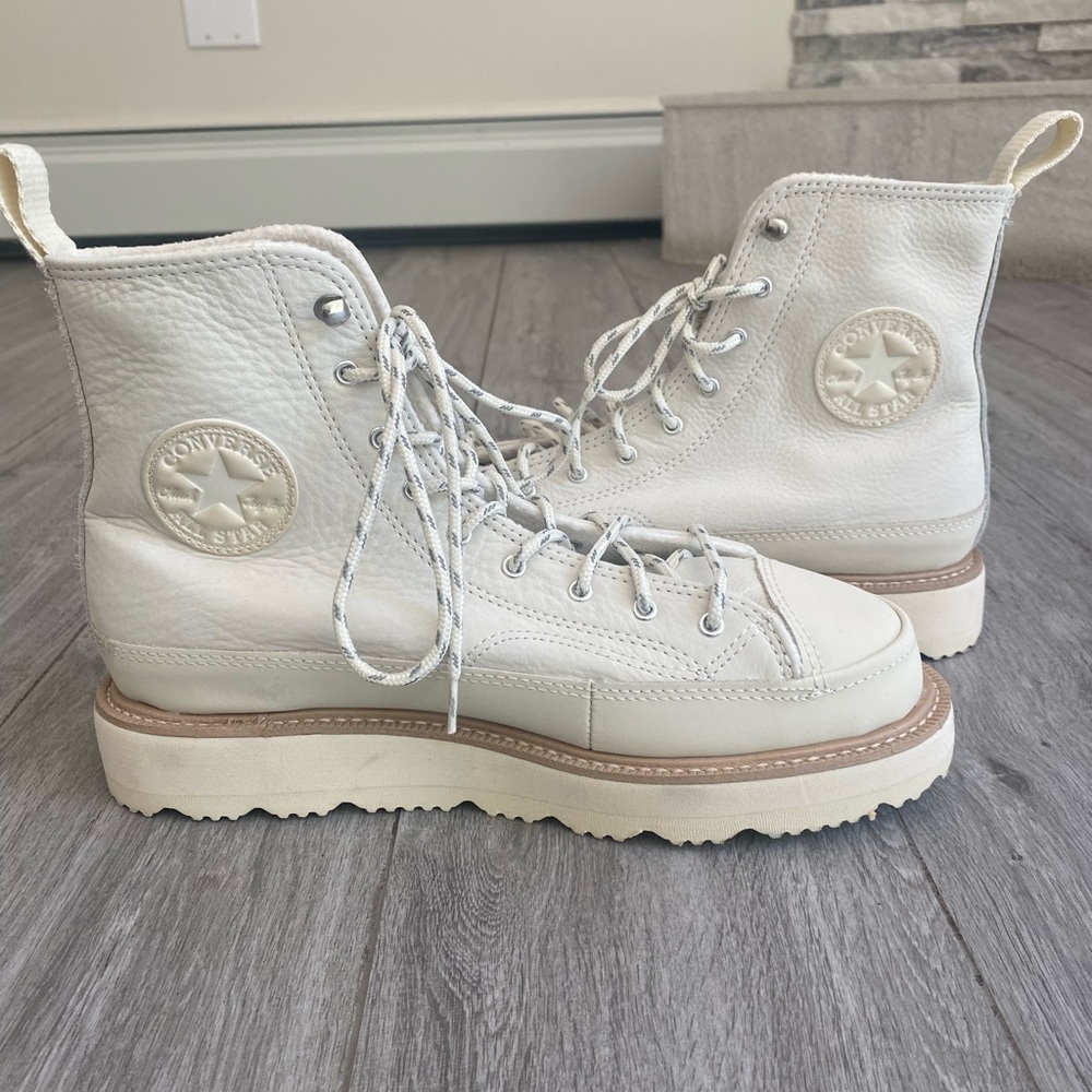 Converse women’s leather high tops.